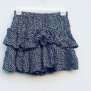 SO “goods for life” black w/ pink flowers mini skirt size small